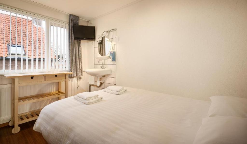 Hotel-Pension Ouddorp Kamer foto